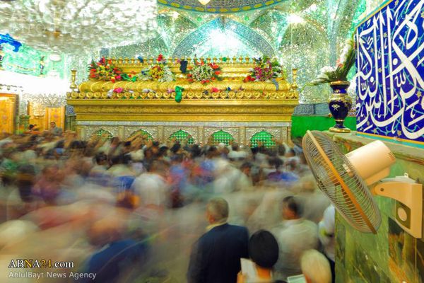 تشرف میلیونها شیعه با شاخههای گل به حرم امیرالمومنین(ع) + تصاویر